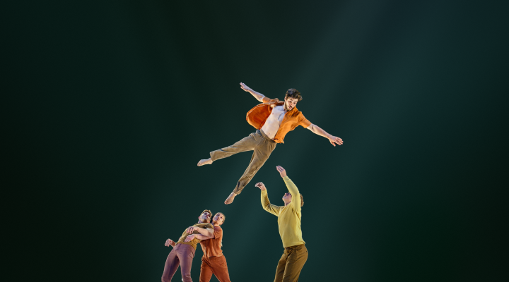 Circa acrobat flying over other acrobats