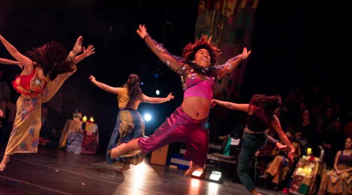 Contra-Tiempo dancers performing on stage