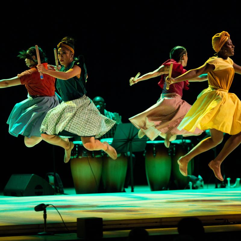 dancers twirling in midair 
