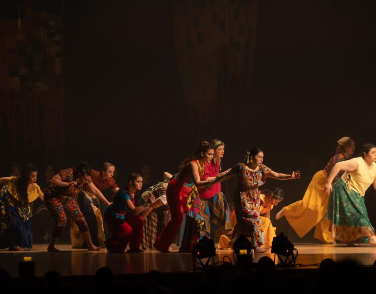 dancers performing on stage 