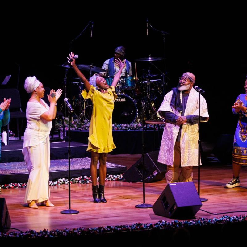 artist from Let Love Lead performing on stage